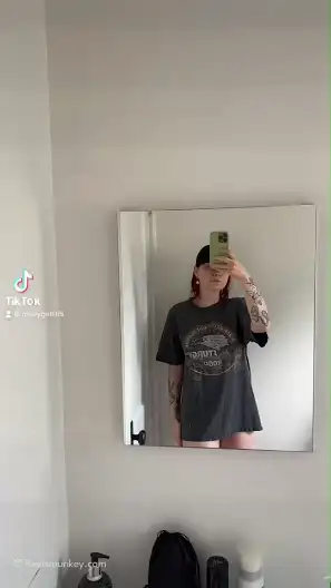 Pretty babe showing her curves on the mirror trend