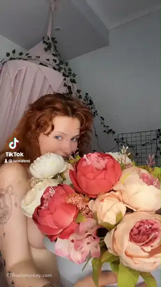 Ginger slowly reveals her pink nipples on TikTok porn