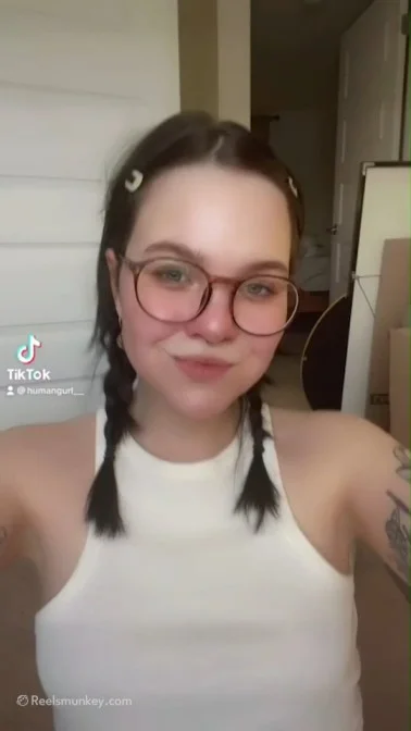 Cute playfull nerd @roseeemmi with glasses goes topless and exposes her sexy tattoos