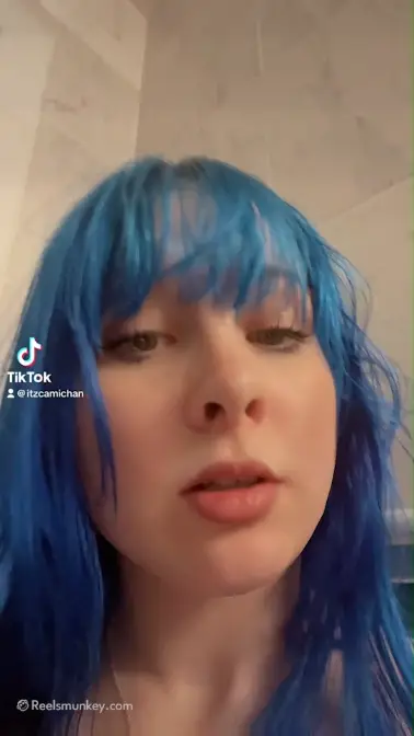 Blue haired thot reveals her nudes for shower room