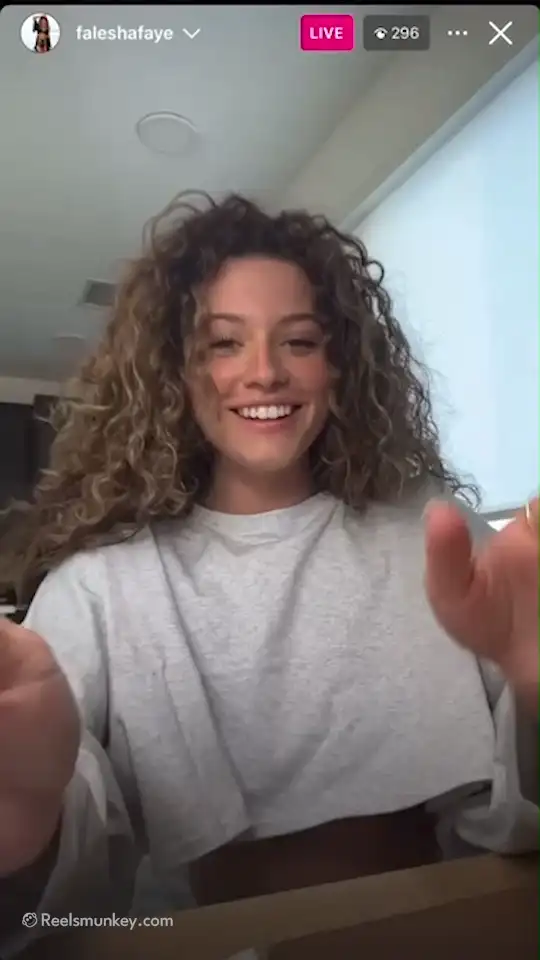 curly influencer having a cute nipslip on instagram live