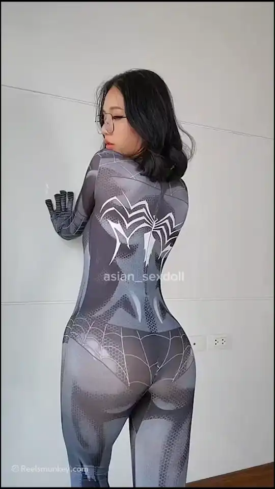 Cute asian spidy shoots her dress instead of the web