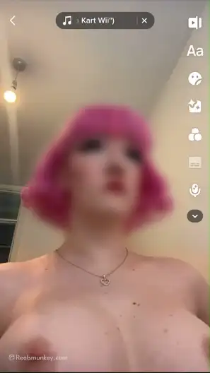 Pretty red hair girl doing mario run with her sexy boobs