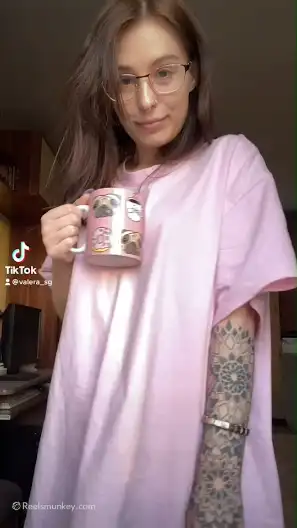 Nude TikTok Thot with perfect ass greets you with a morning coffee.